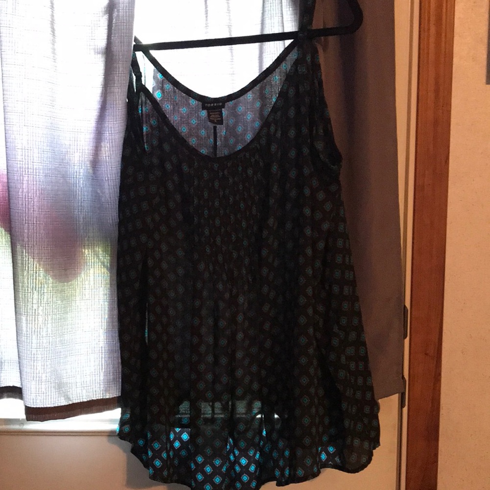 Trapeze style tank